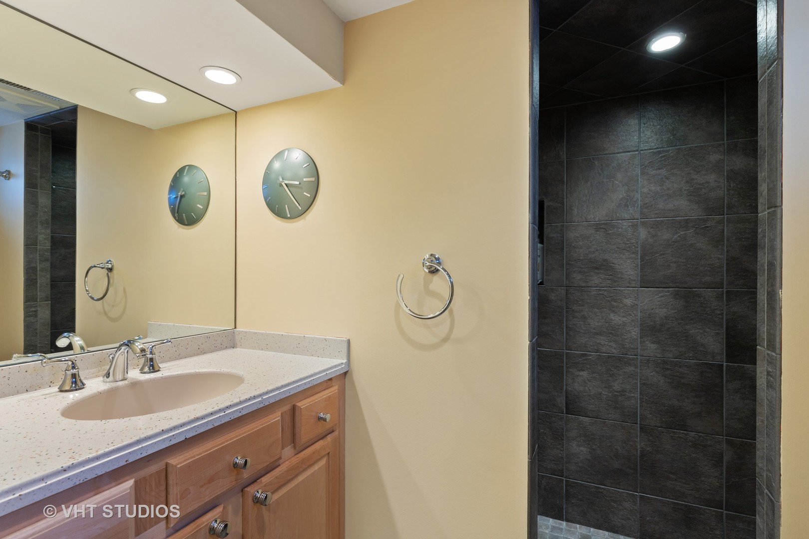 245 East St Charles Road Elmhurst, IL 60126 - Photo 13 of 18 a bathroom with a sink vanity granite and a mirror