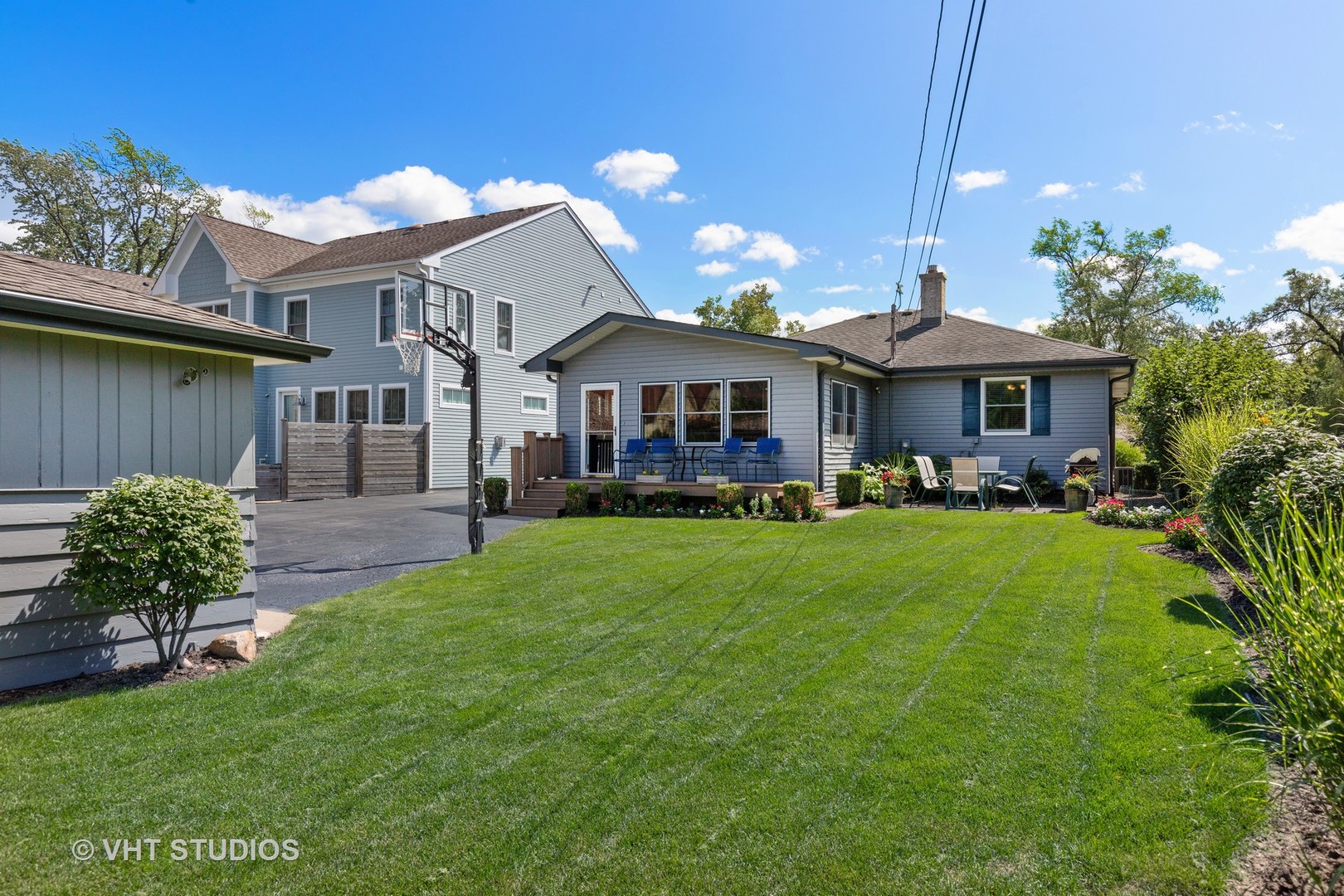 245 East St Charles Road Elmhurst, IL 60126 - Photo 17 of 18 a front view of a house with garden