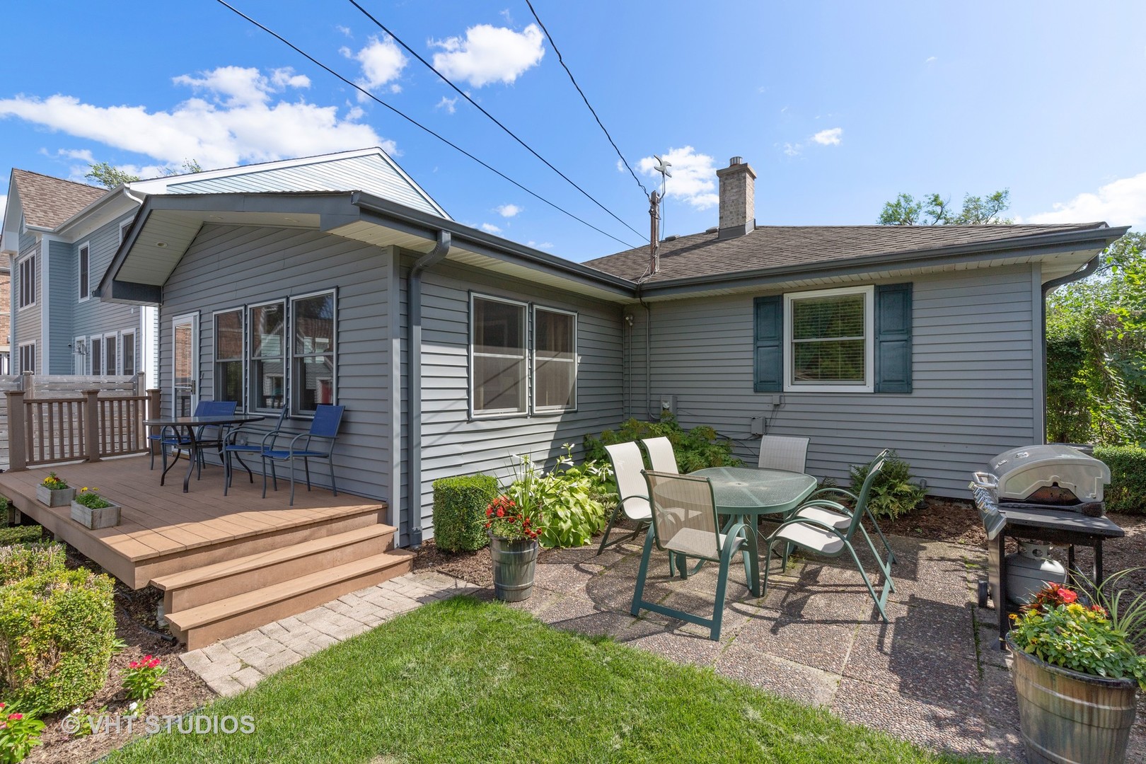 245 East St Charles Road Elmhurst, IL 60126 - Photo 18 of 18 a view of a house with a patio