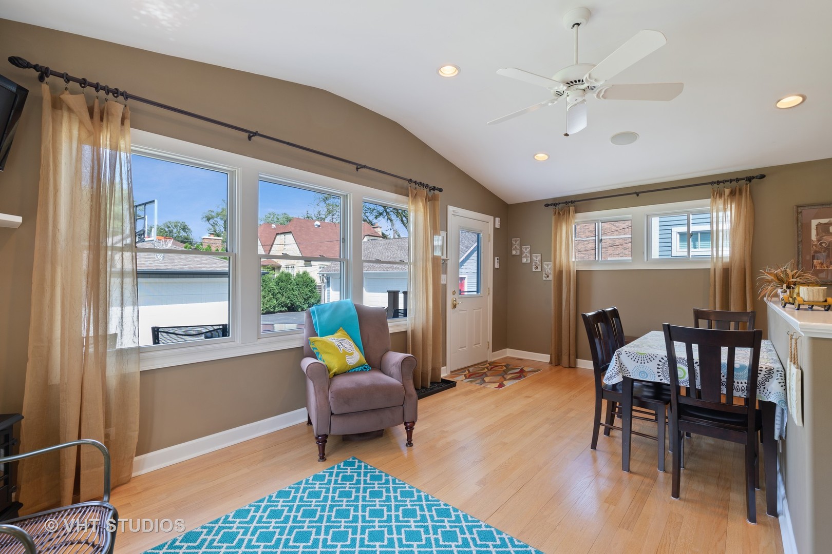 245 East St Charles Road Elmhurst, IL 60126 - Photo 8 of 18 a living room with furniture and a window