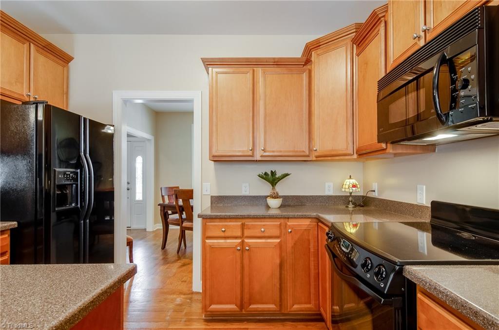 3940 Johnson Street High Point, NC 27265 - Photo 15 of 30 Additional view of kitchen. Doorway leads to dining room.