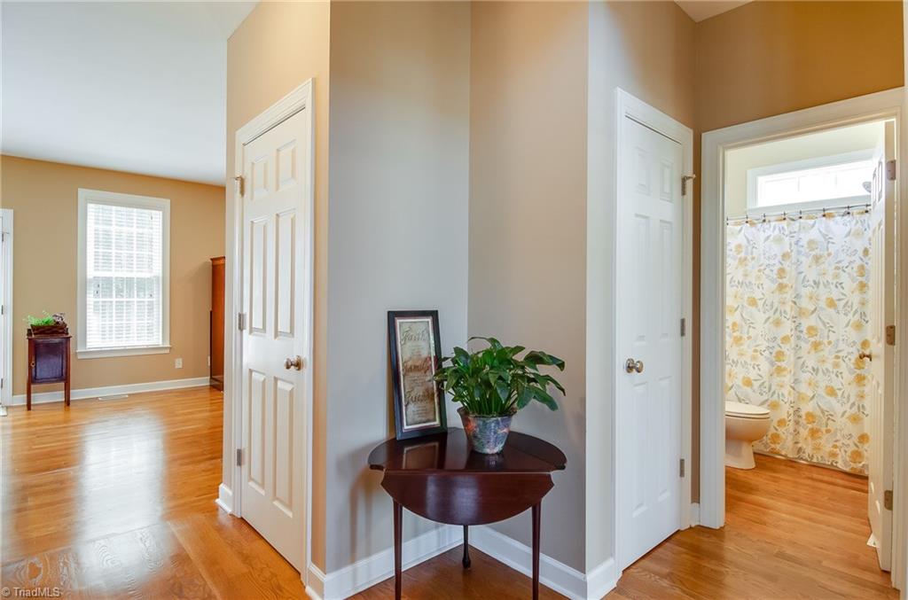 3940 Johnson Street High Point, NC 27265 - Photo 5 of 30 This is another view from the entry. Ahead is the great room and to the right is a full bedroom and full bath. This home has tons of storage: door to the right is linen closet, door to the left is coat closet, plus large walk in closets in all upstairs bedrooms, closets in all baths, fully floored attic, shelving in garage, and pantry in kitchen.