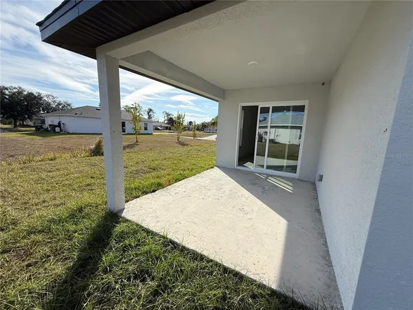 a view of a floor to ceiling window and lake view