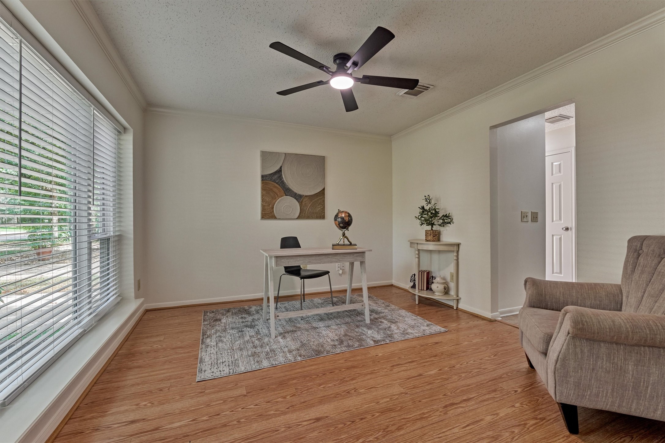 71 Breezy Point Place Spring, TX 77381 - Photo 5 of 40 Home Office/Study with large front windows for beautiful natural light. Opening on right leads to Kitchen/Half Bath.
