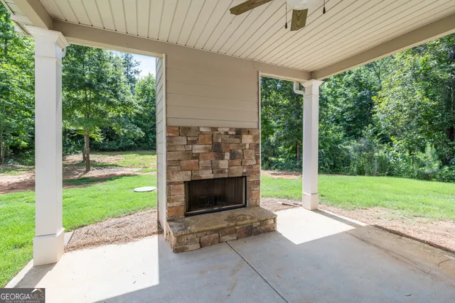 a view of staircase with wooden floor and a rug
