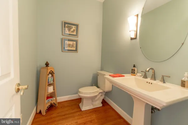 a bed room with a bed and a chandelier