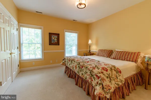 a bathroom with a sink toilet and vanity