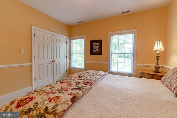 an aerial view of a house with a lake view