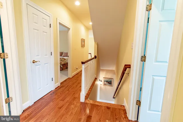 a view of a field with trees in the background