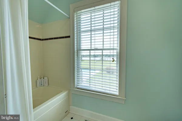 a view of a lake with a building in the background