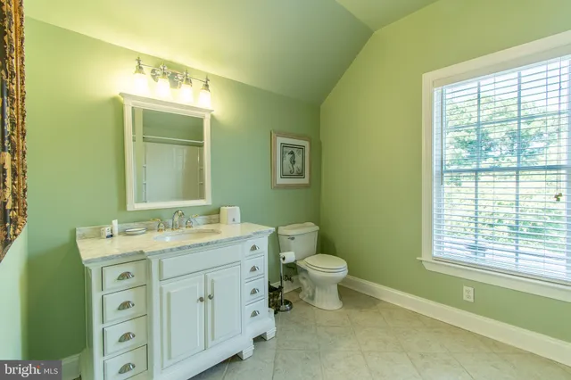 a view of a lake with a building in the background