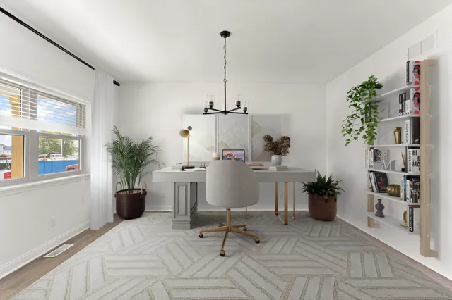 a workspace with furniture and window