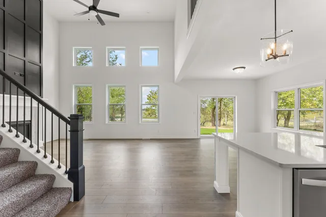 a view of an entryway with kitchen area