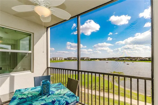 a view of a balcony with wooden floor