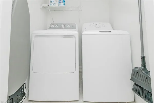 a view of a bathroom with a shower curtain