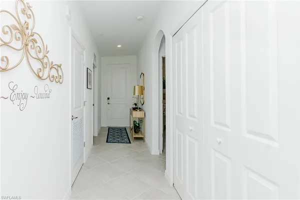 a room with a chair and a table