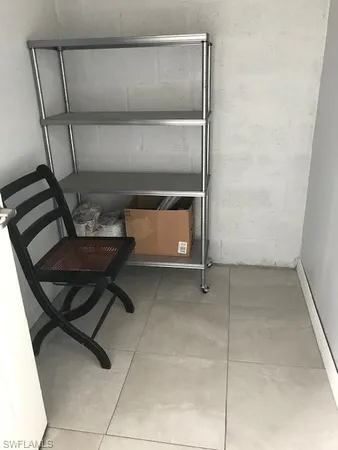 a view of a park with a palm trees