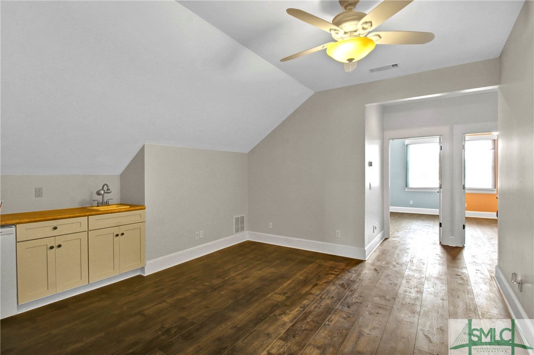 1600 Arcola Road Pembroke, GA 31321 - Photo 30 of 50 Upstairs loft area with wet bar & fridge