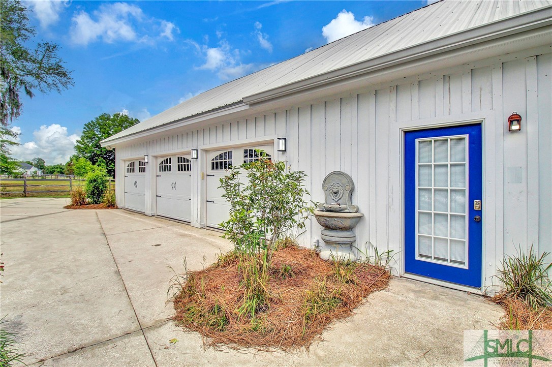 1600 Arcola Road Pembroke, GA 31321 - Photo 35 of 50 3 car garage with garage apartment entrance