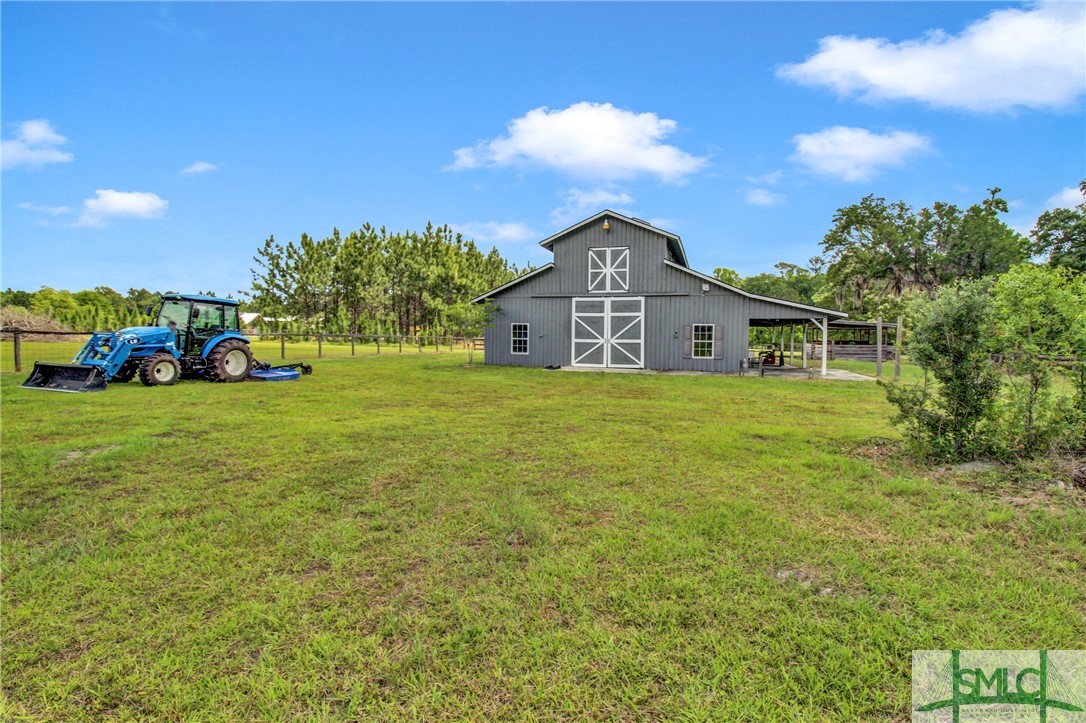 1600 Arcola Road Pembroke, GA 31321 - Photo 40 of 50 Barn with 6 horse stalls, separate office, bathroo