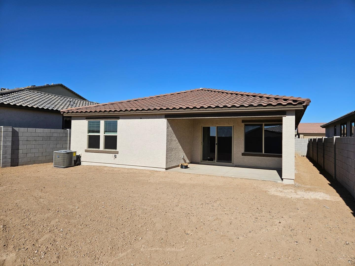 18255 West Pima Street Goodyear, AZ 85338 - Photo 3 of 12 a front view of a house with a outdoor space