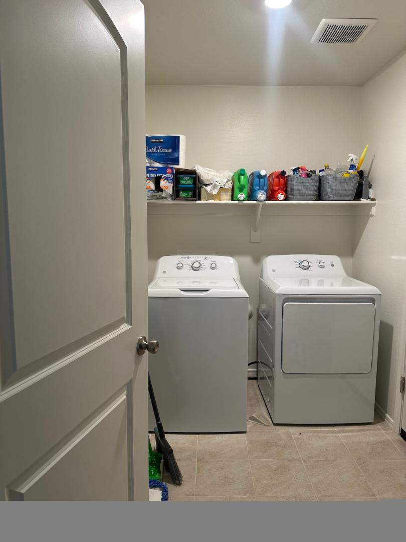 18255 West Pima Street Goodyear, AZ 85338 - Photo 10 of 12 a utility room with dryer and washer