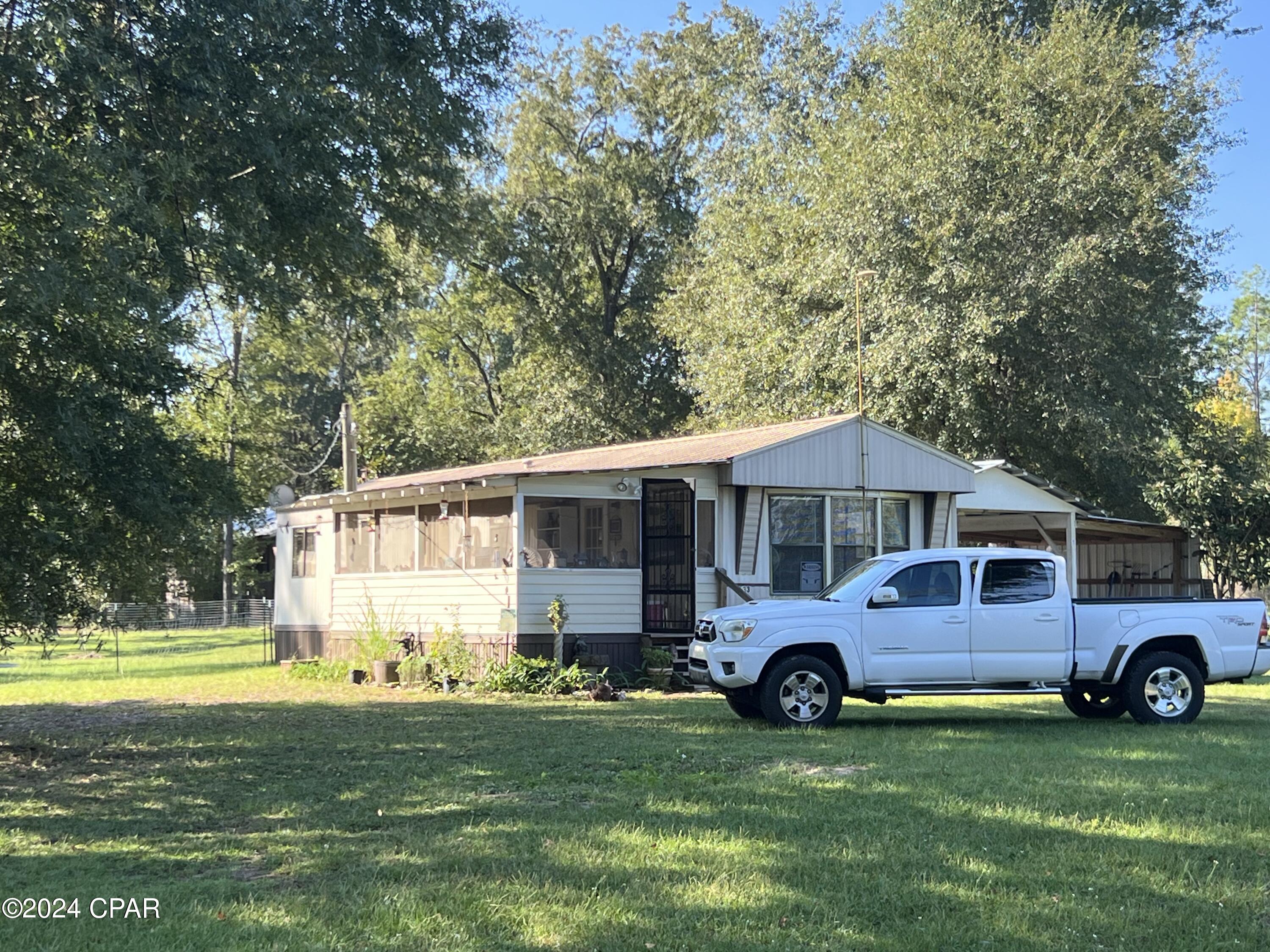 7633 Parramore Road Sneads, FL 32460 - Photo 1 of 12