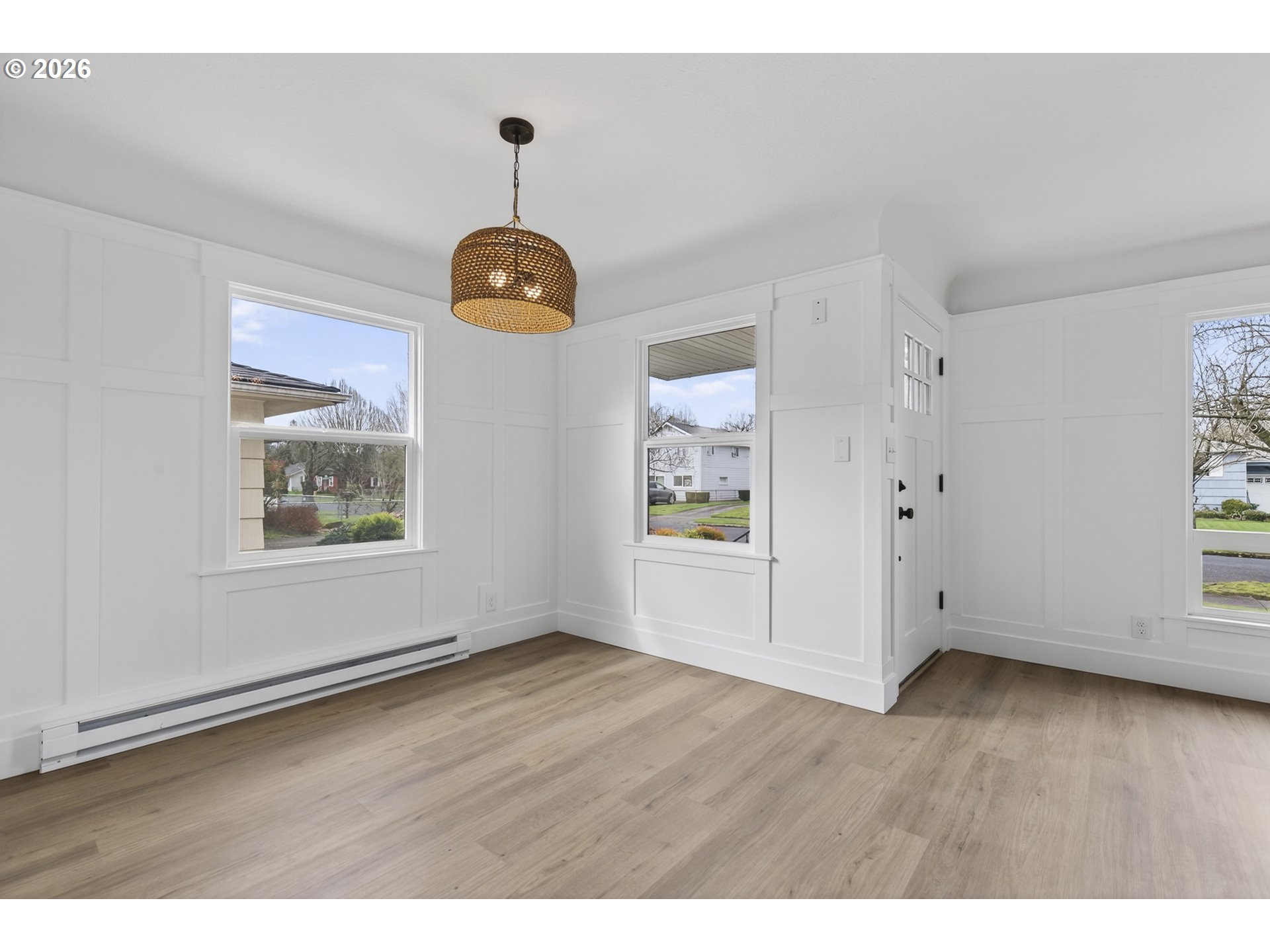 520 24th Avenue Longview, WA 98632 - Photo 11 of 37 a view of an empty room with wooden floor and a window