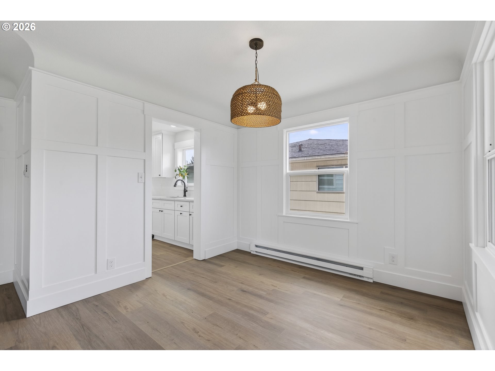 520 24th Avenue Longview, WA 98632 - Photo 12 of 37 a view of an empty room with wooden floor and windows