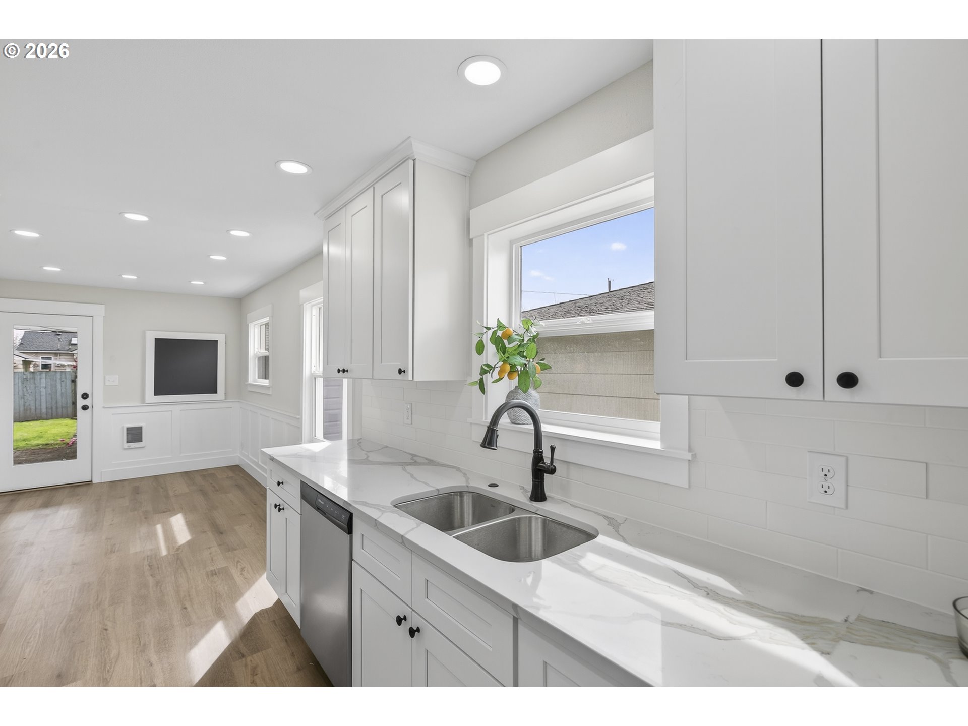 520 24th Avenue Longview, WA 98632 - Photo 14 of 37 a kitchen with a sink and cabinets