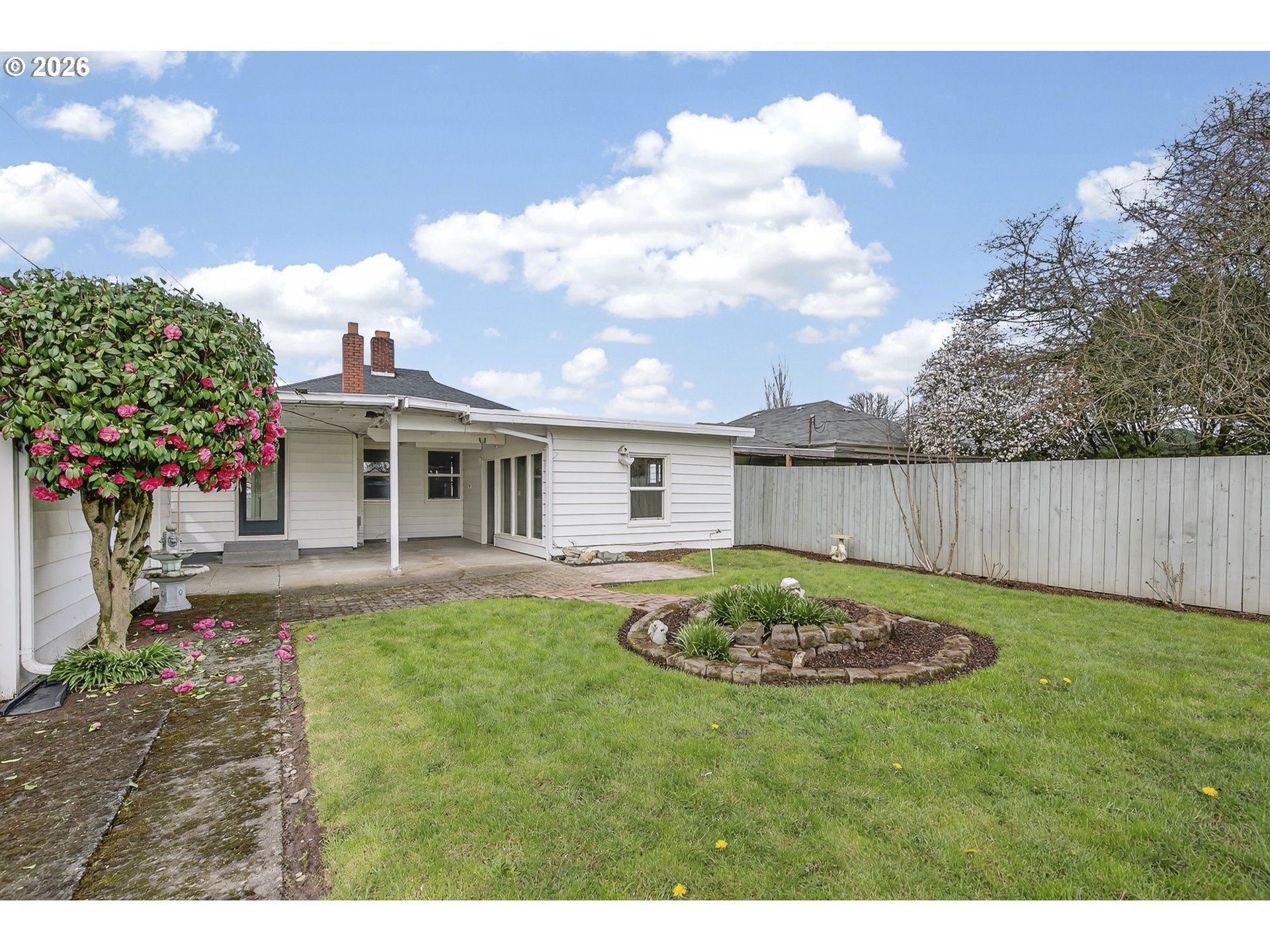 520 24th Avenue Longview, WA 98632 - Photo 34 of 37 a view of a backyard with a garden and entertaining space