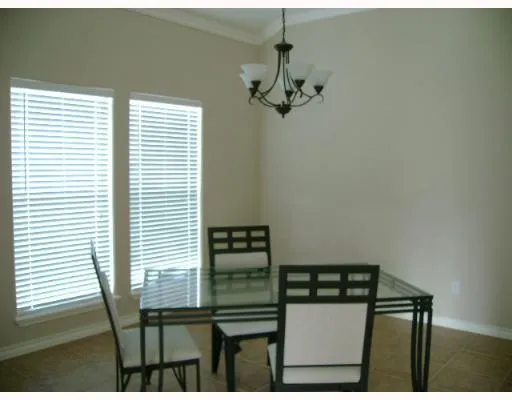 a view of a balcony with furniture
