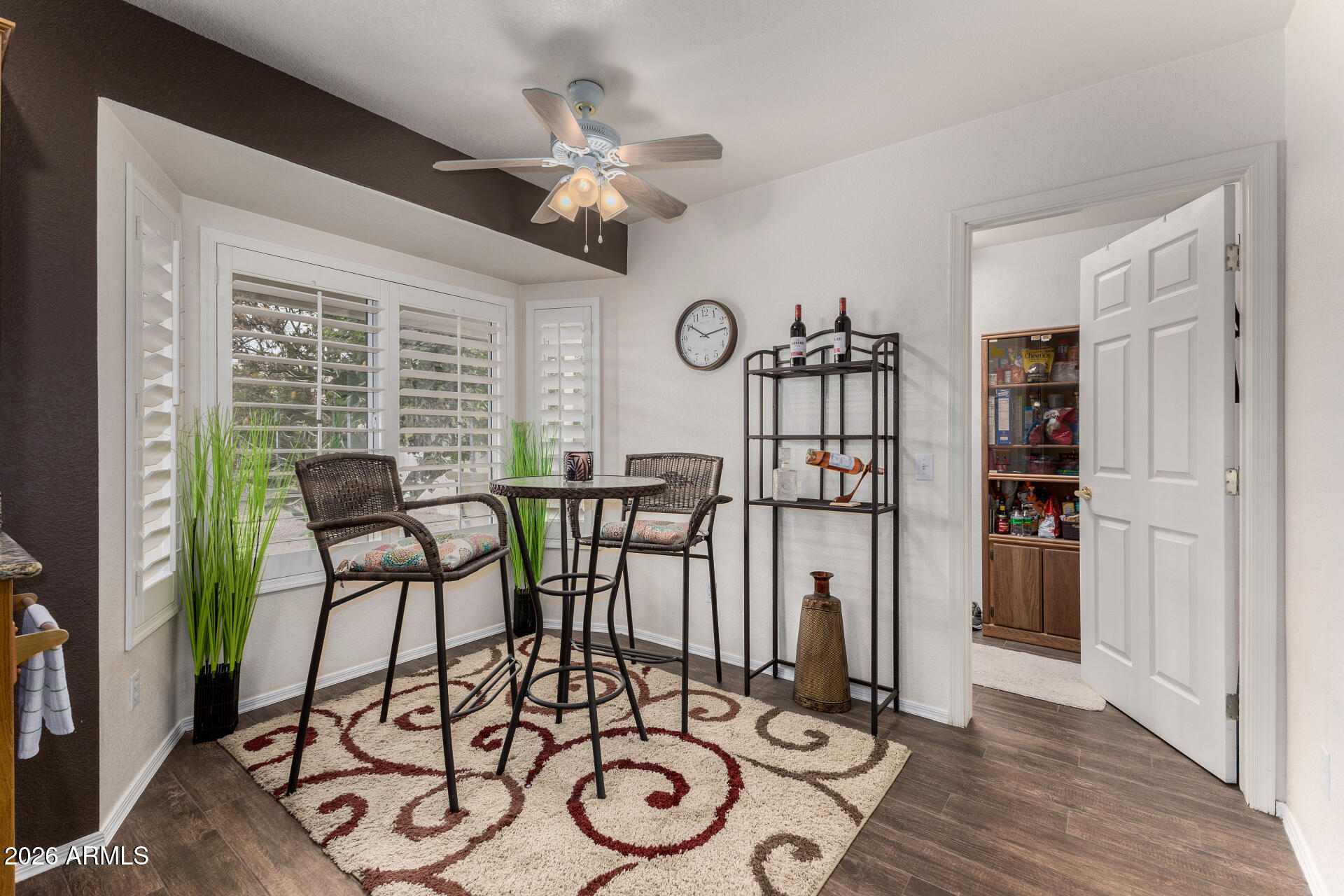 15764 Piccadilly Road Goodyear, AZ 85395 - Photo 13 of 31 a view of a livingroom with furniture and a chandelier