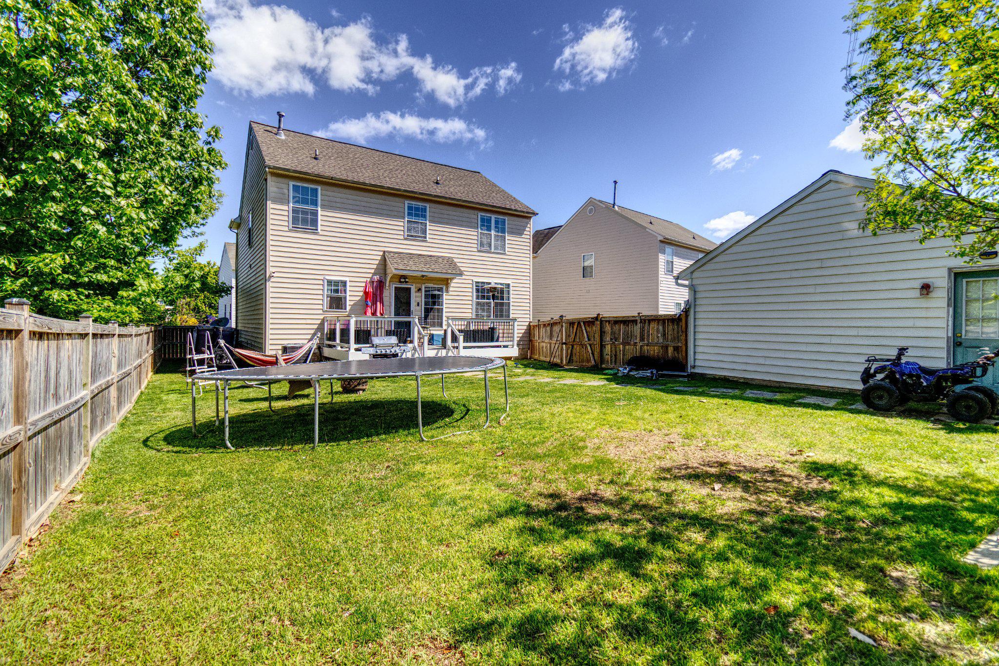 215 Seamaster Road Essex, MD 21221 - Photo 39 of 40 a view of a house with a yard patio and swimming pool