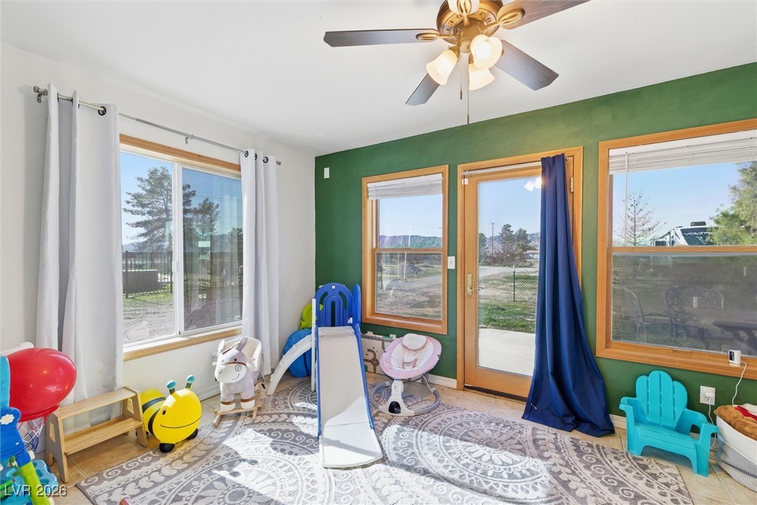 2570 East Kellogg Road Pahrump, NV 89048 - Photo 21 of 54 Game room, playroom, den, office. Whatever you'd like it to be.