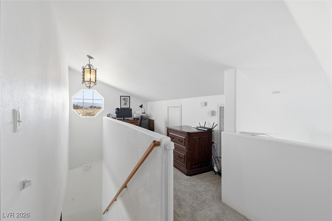 2570 East Kellogg Road Pahrump, NV 89048 - Photo 28 of 54 Upstairs loft with custom-built desk/office area.