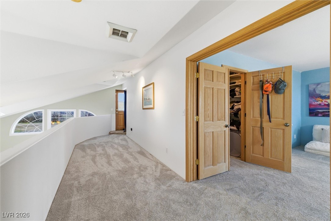 2570 East Kellogg Road Pahrump, NV 89048 - Photo 29 of 54 Upstairs loft area with door to balcony.