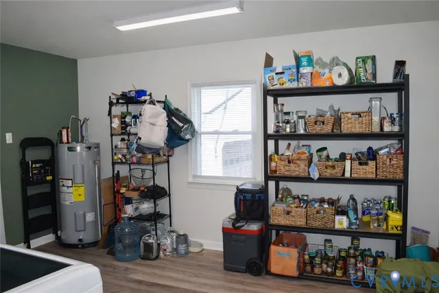 a room with lots of different kinds of books