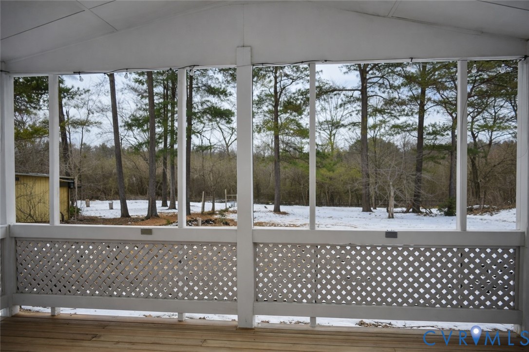 5521 Richmond Road Amelia Court House, VA 23002 - Photo 24 of 28 sunroom with lofted ceiling
