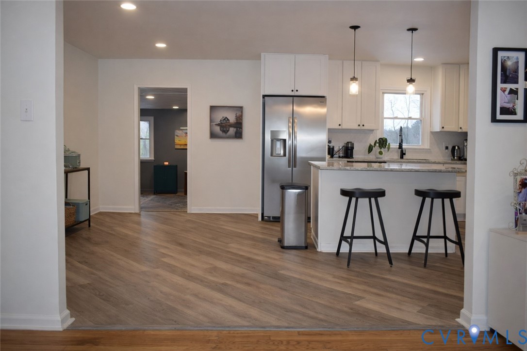 5521 Richmond Road Amelia Court House, VA 23002 - Photo 5 of 28 Kitchen with a breakfast bar, stainless steel refr