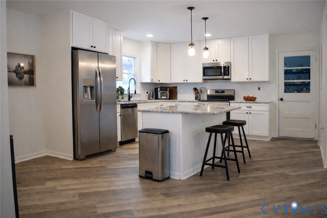5521 Richmond Road Amelia Court House, VA 23002 - Photo 7 of 28 Kitchen with stainless steel appliances, hanging l