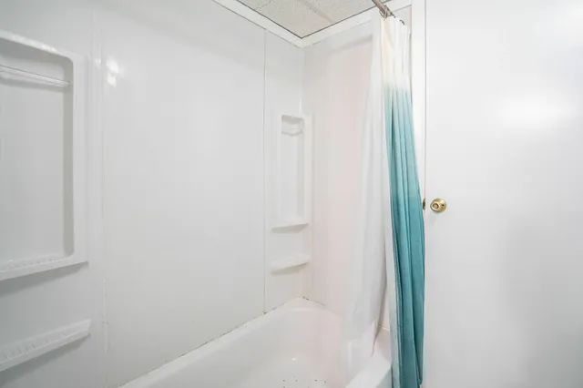 a bathroom with a bathtub