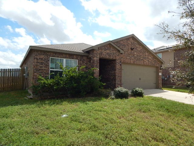 2095 Mule Ridge Drive Katy, TX 77493 - Photo 2 of 9 a front view of house with yard and green space