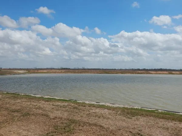 a view of a lake and mountain in the back