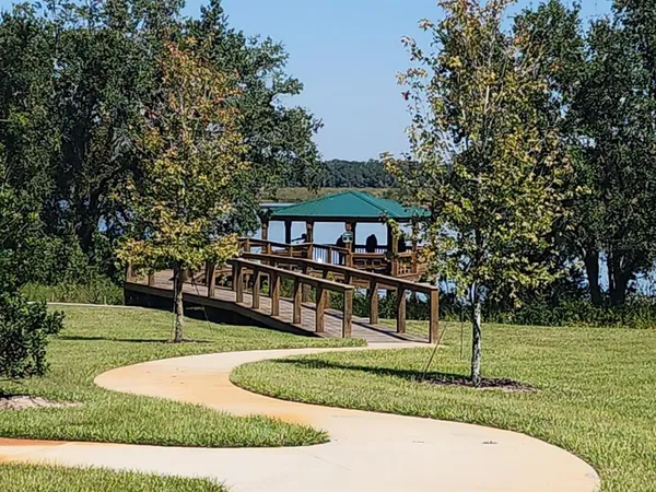 a view of front of a house with a garden