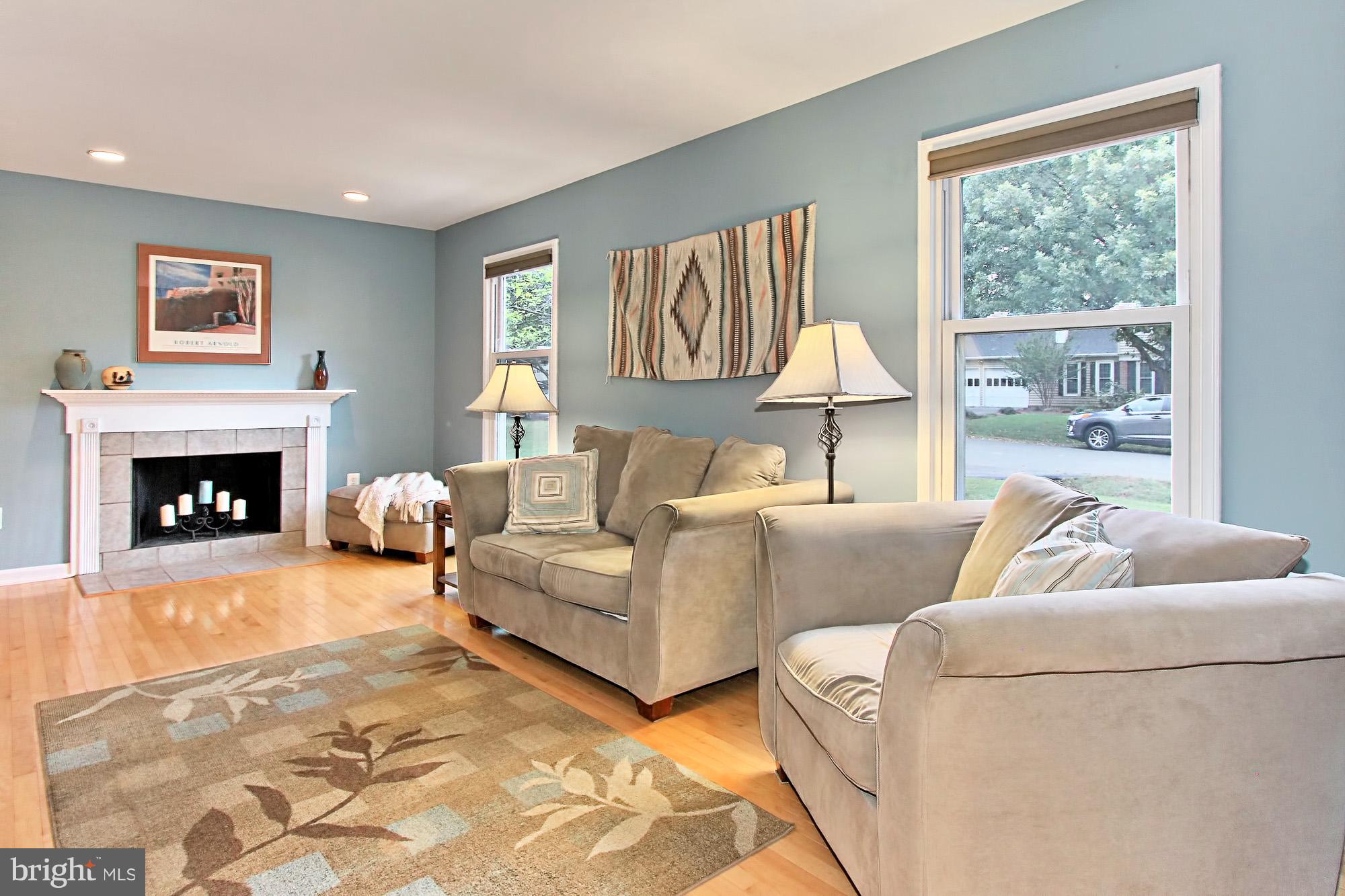 2309 Ballycairne Court Reston, VA 20191 - Photo 3 of 29 Light-Filled Family Room with Wood Floors
