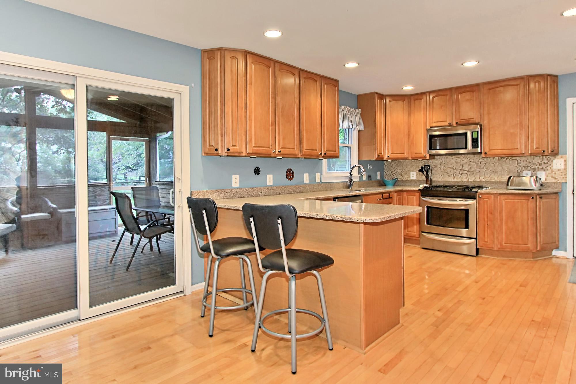 2309 Ballycairne Court Reston, VA 20191 - Photo 10 of 29 Eat-In Kitchen Opens to Screen Porch
