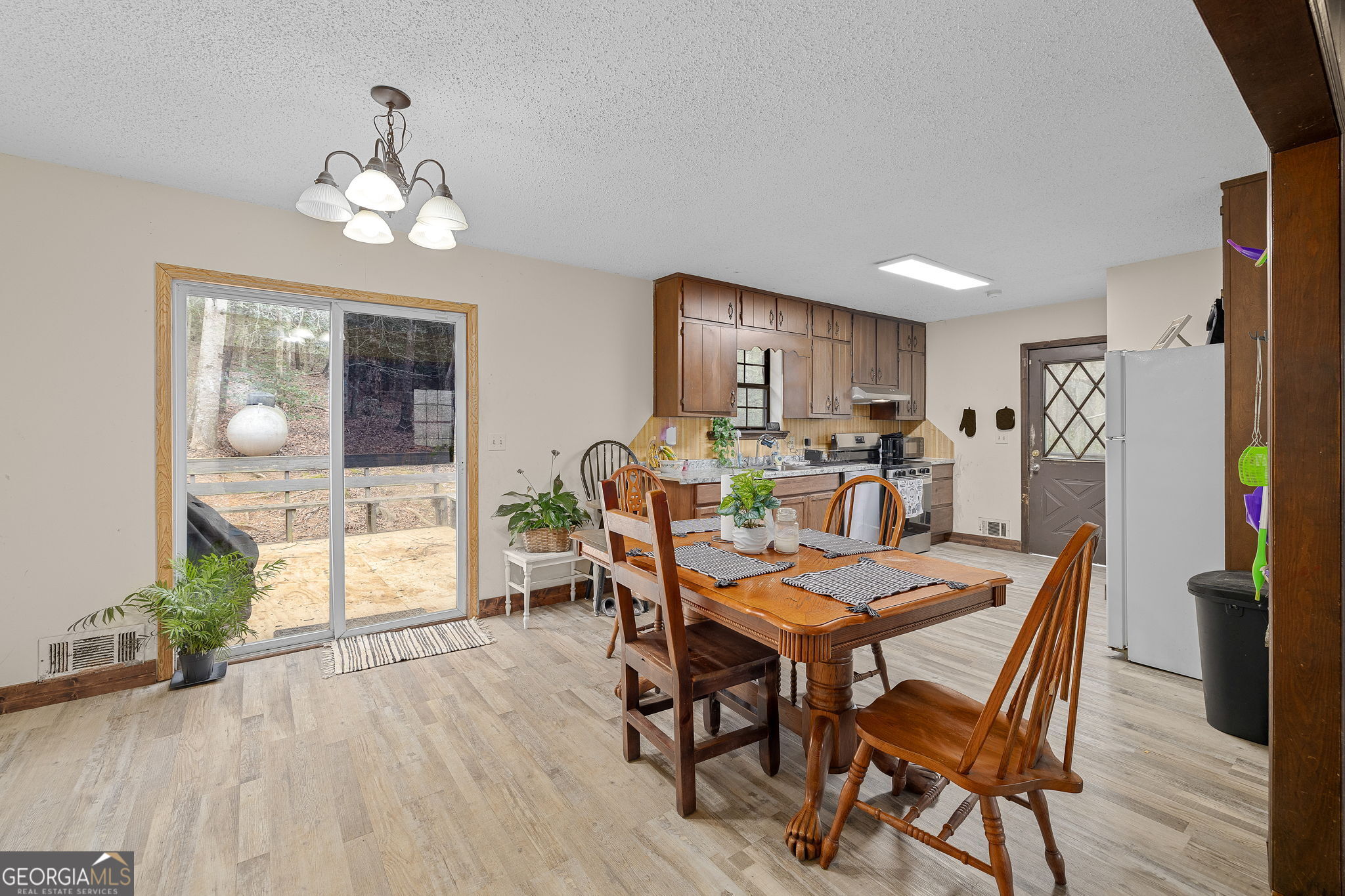 89 Ts Jarrard Road Dahlonega, GA 30533 - Photo 11 of 48 a dining room with furniture and window