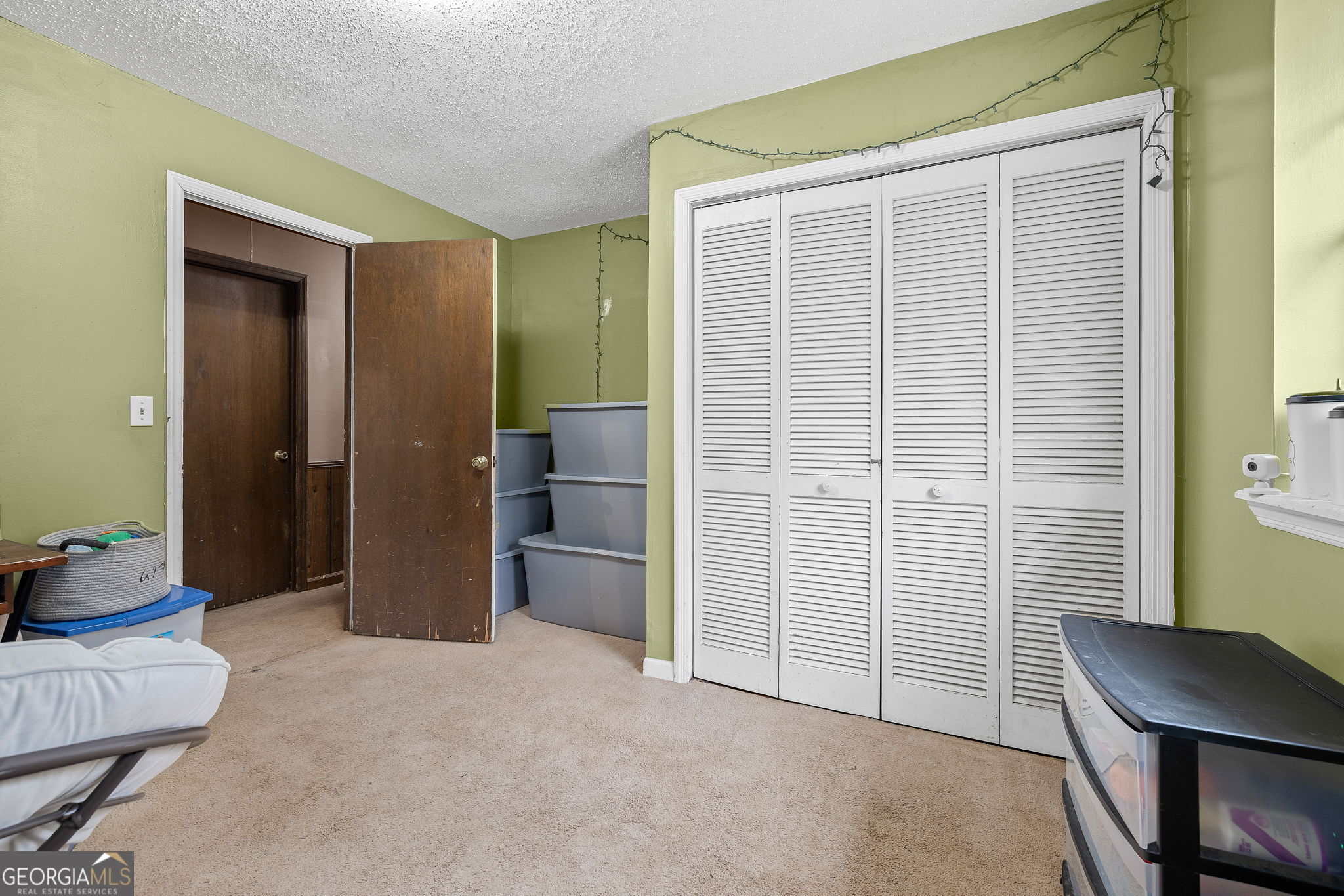 89 Ts Jarrard Road Dahlonega, GA 30533 - Photo 20 of 48 a view of a livingroom with furniture and cabinet