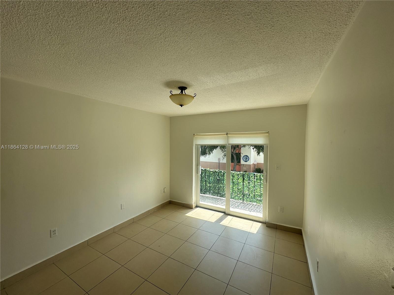 627 Southwest 3rd Street, Unit 4 Miami, FL 33130 - Photo 1 of 12 a view of an empty room and window